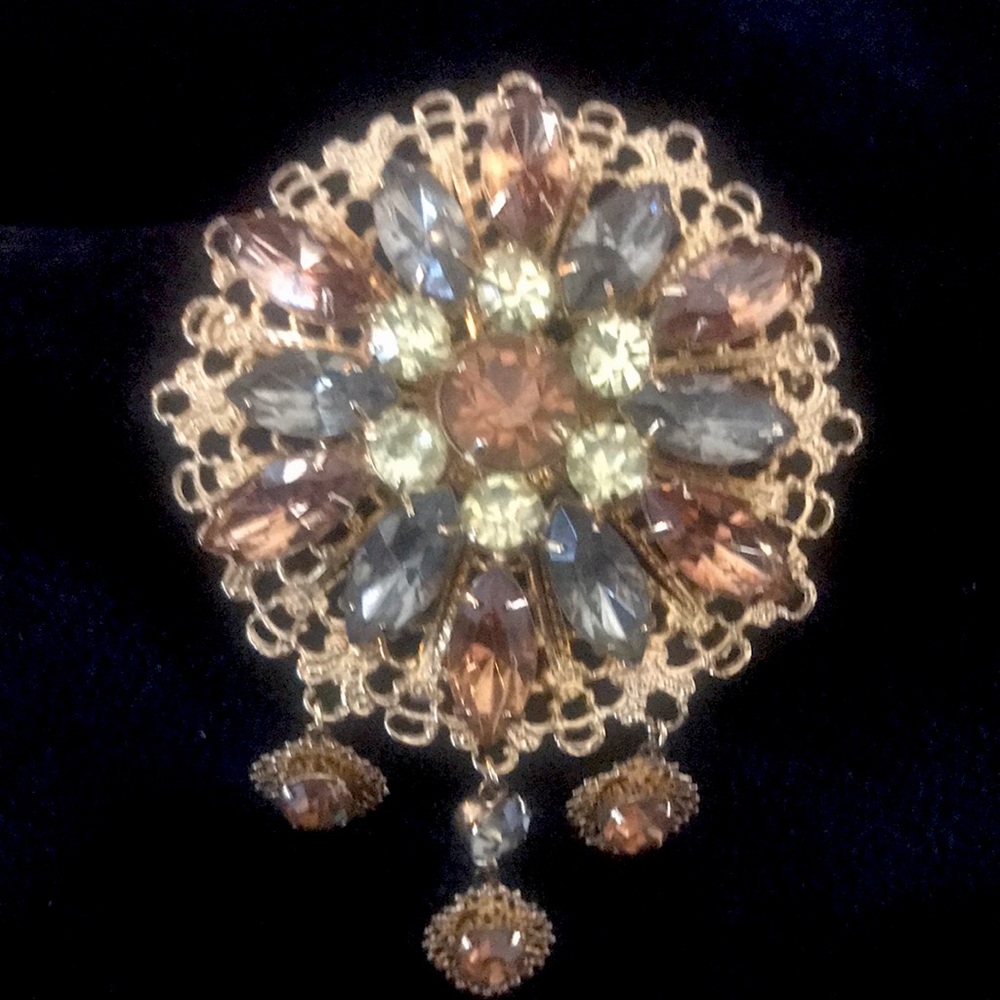 Emmons signed brooch, boosts topaz Rhinestones and gold tone filigree
